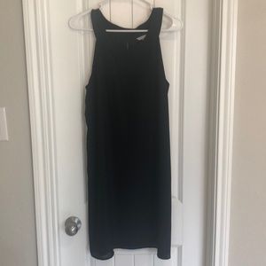 Black H&M shift dress with bow detail.